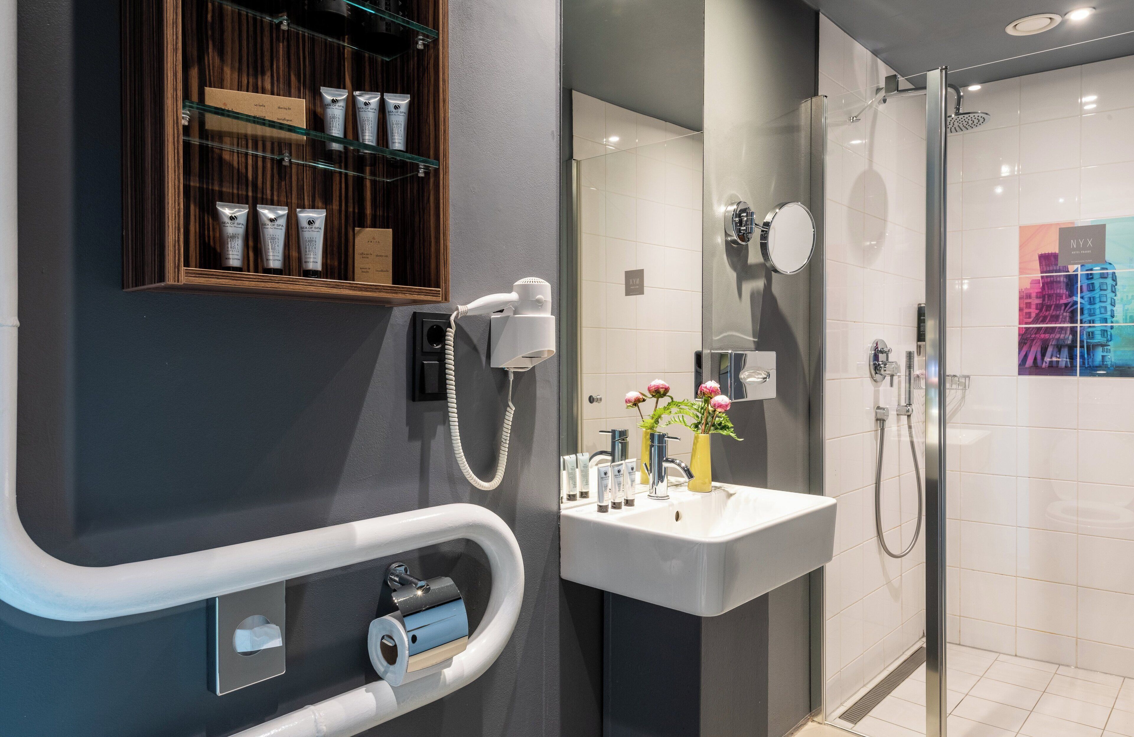 junior suite (nyx suite) | bathroom | shower, rainfall showerhead, free toiletries, hair dryer
