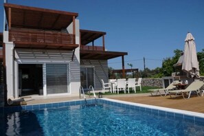 Outdoor pool, pool umbrellas, pool loungers