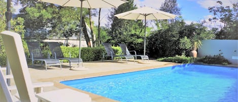 Outdoor pool, pool umbrellas, pool loungers