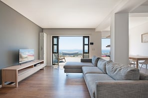 Villa, 1 très grand lit, vue sur la mer, face à la mer | Salle de séjour