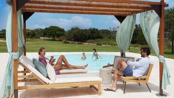 Outdoor pool, pool umbrellas, pool loungers