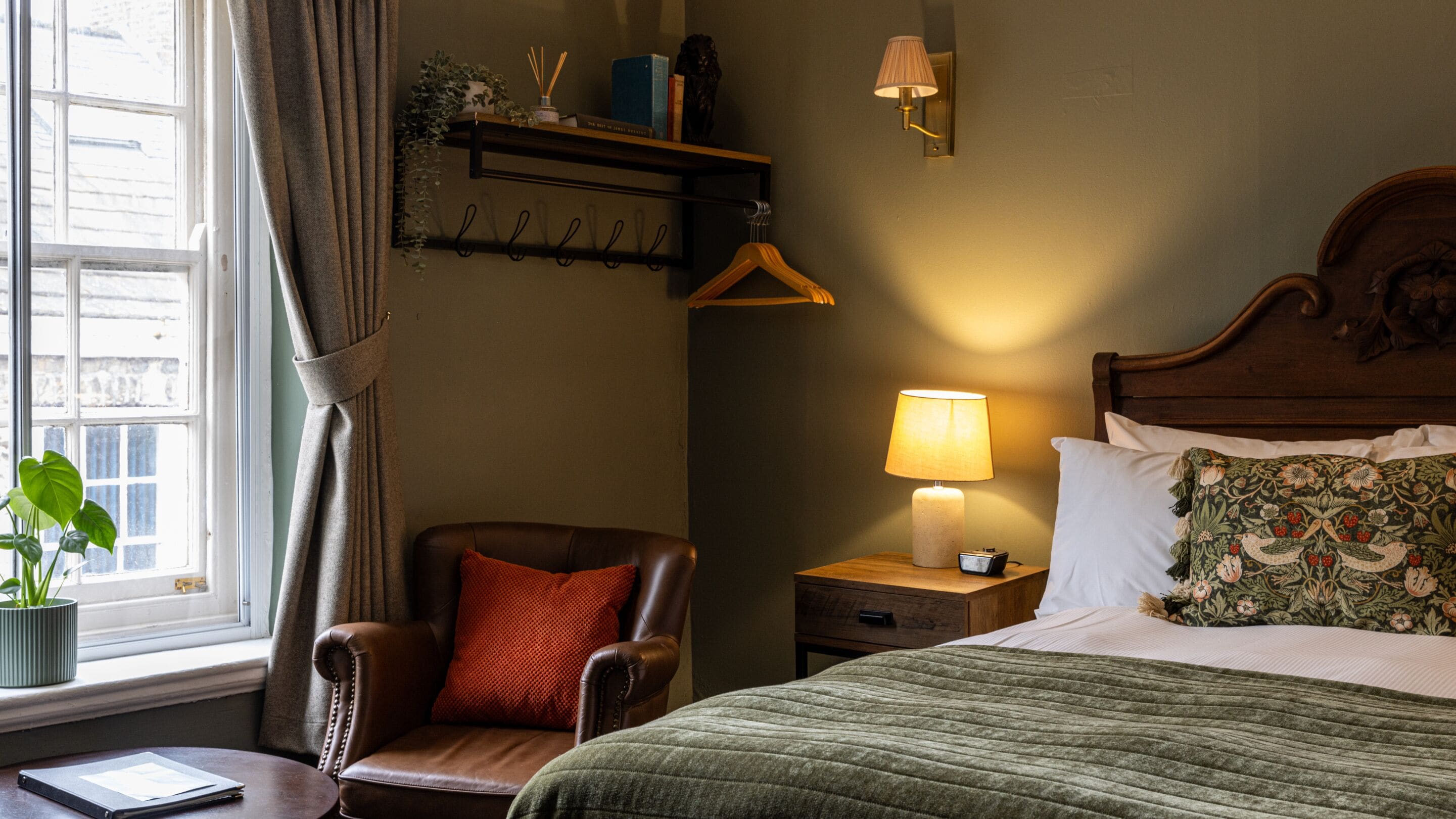 Desk, blackout drapes, iron/ironing board, bed sheets