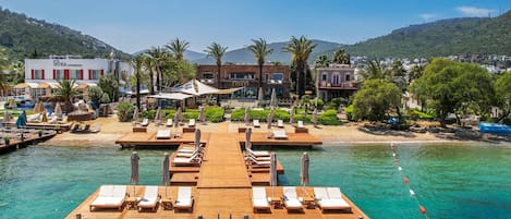 Private beach, free beach cabanas, sun loungers, beach umbrellas