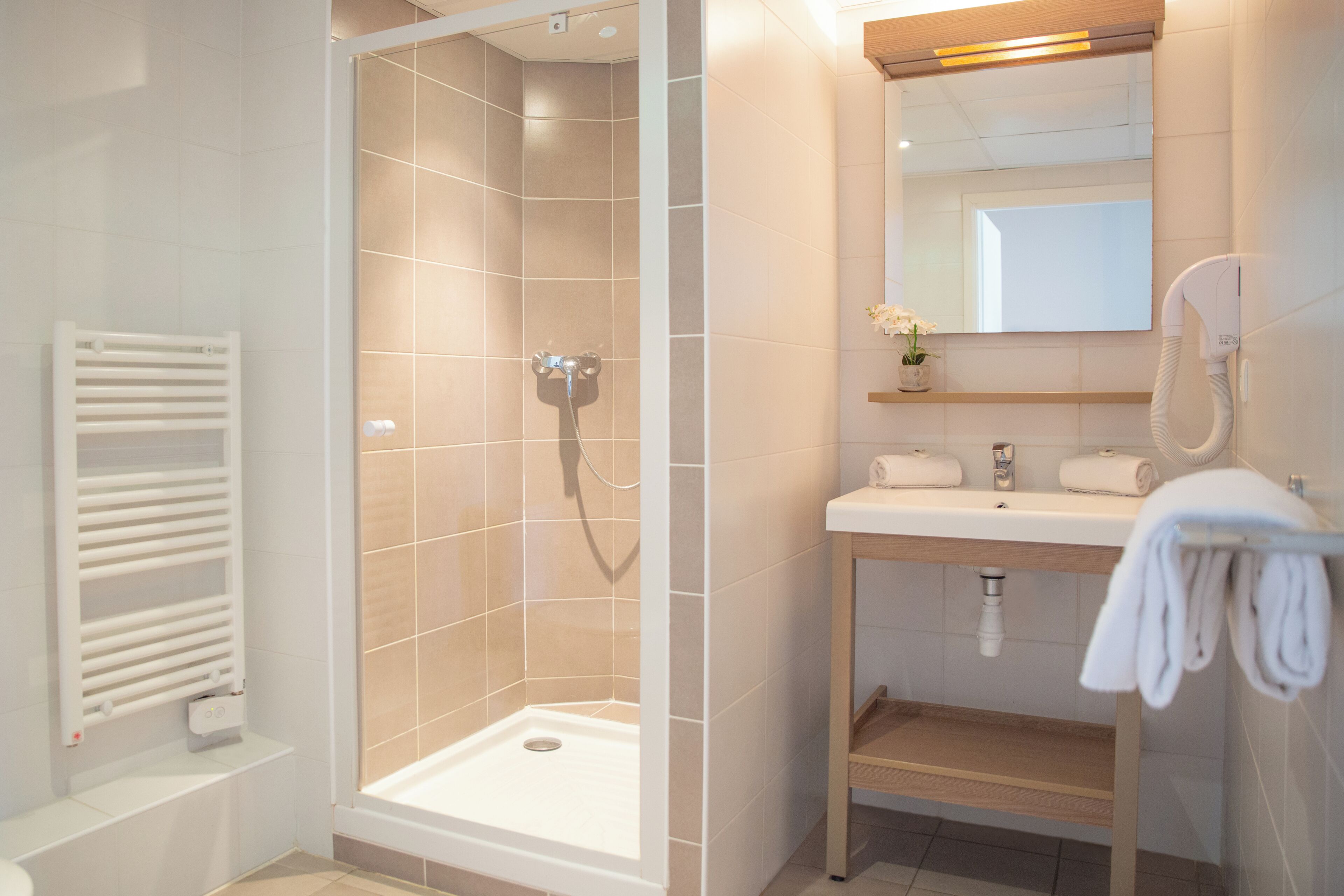 Shower, eco-friendly toiletries, hair dryer, towels