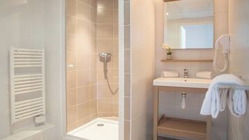 Shower, eco-friendly toiletries, hair dryer, towels