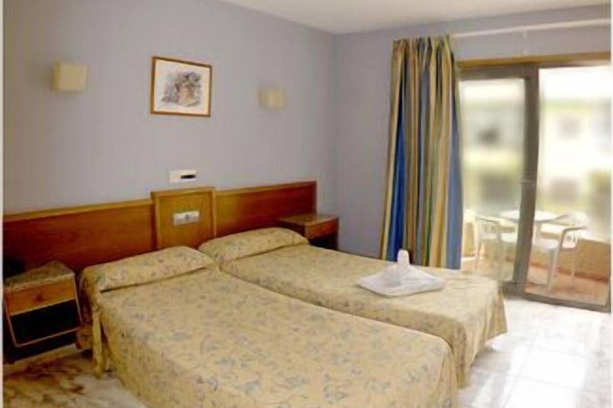 Standaard Twin kamer, privébadkamer | Een kluis op de kamer, gratis babybedden, gratis wifi