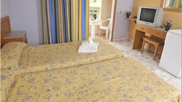 Standard Triple Room, Private Bathroom | In-room safe, free cribs/infant beds, free WiFi