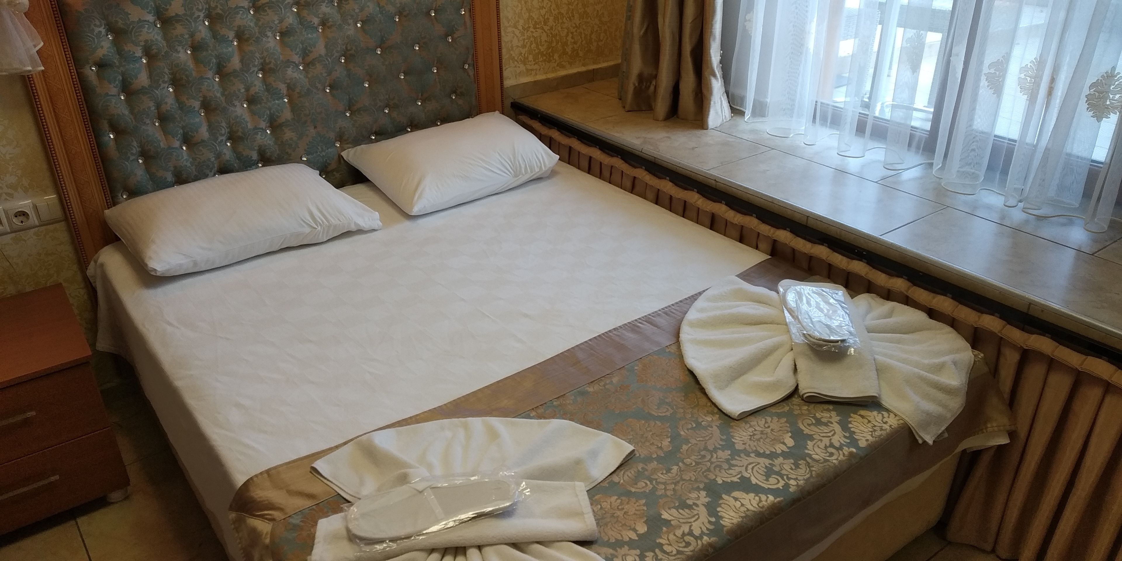 economy double room, garden view | 1 bedroom, minibar, in-room safe, individually decorated