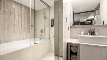 Triple Room, No Windows (B1 Floor) | Bathroom | Combined shower/tub, rainfall showerhead, free toiletries, hair dryer