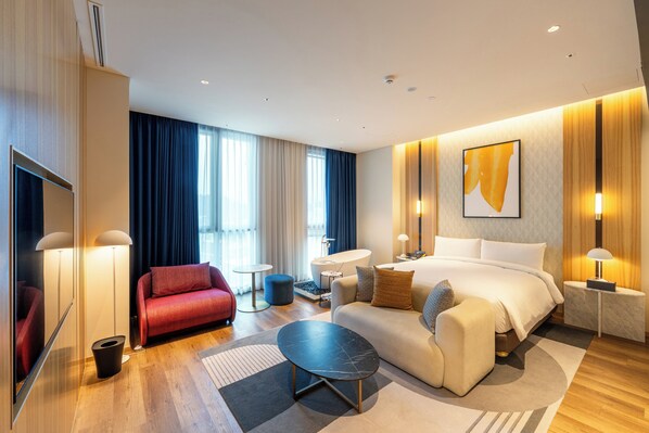 Suite, 1 King Bed with Sofa bed | Free minibar, in-room safe, blackout drapes, soundproofing