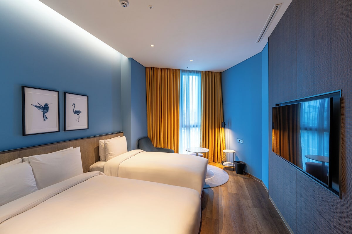 Premium Room, Multiple Beds | 1 bedroom, free minibar, in-room safe, blackout drapes