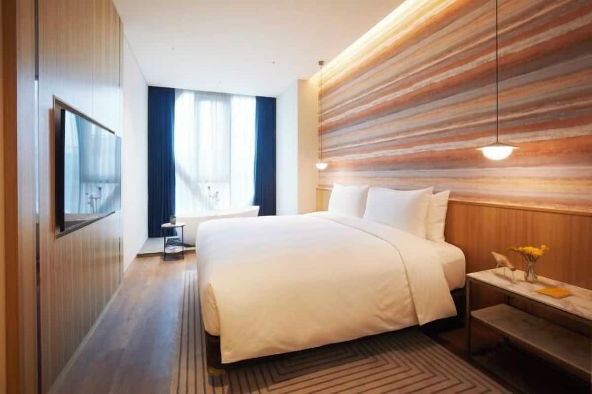 1 dormitori, minibar gratuït i caixa forta a l'habitació