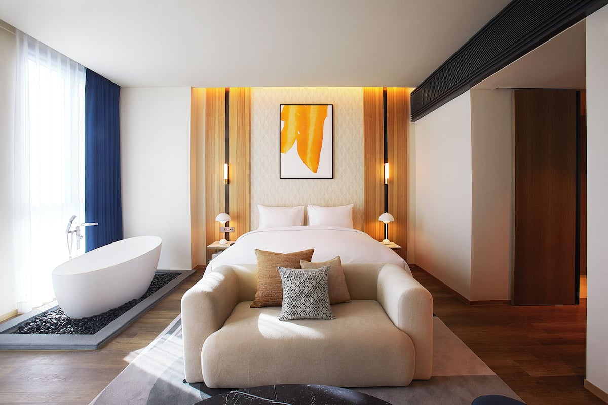 Suite, 1 King Bed with Sofa bed | 1 bedroom, free minibar, in-room safe, blackout drapes