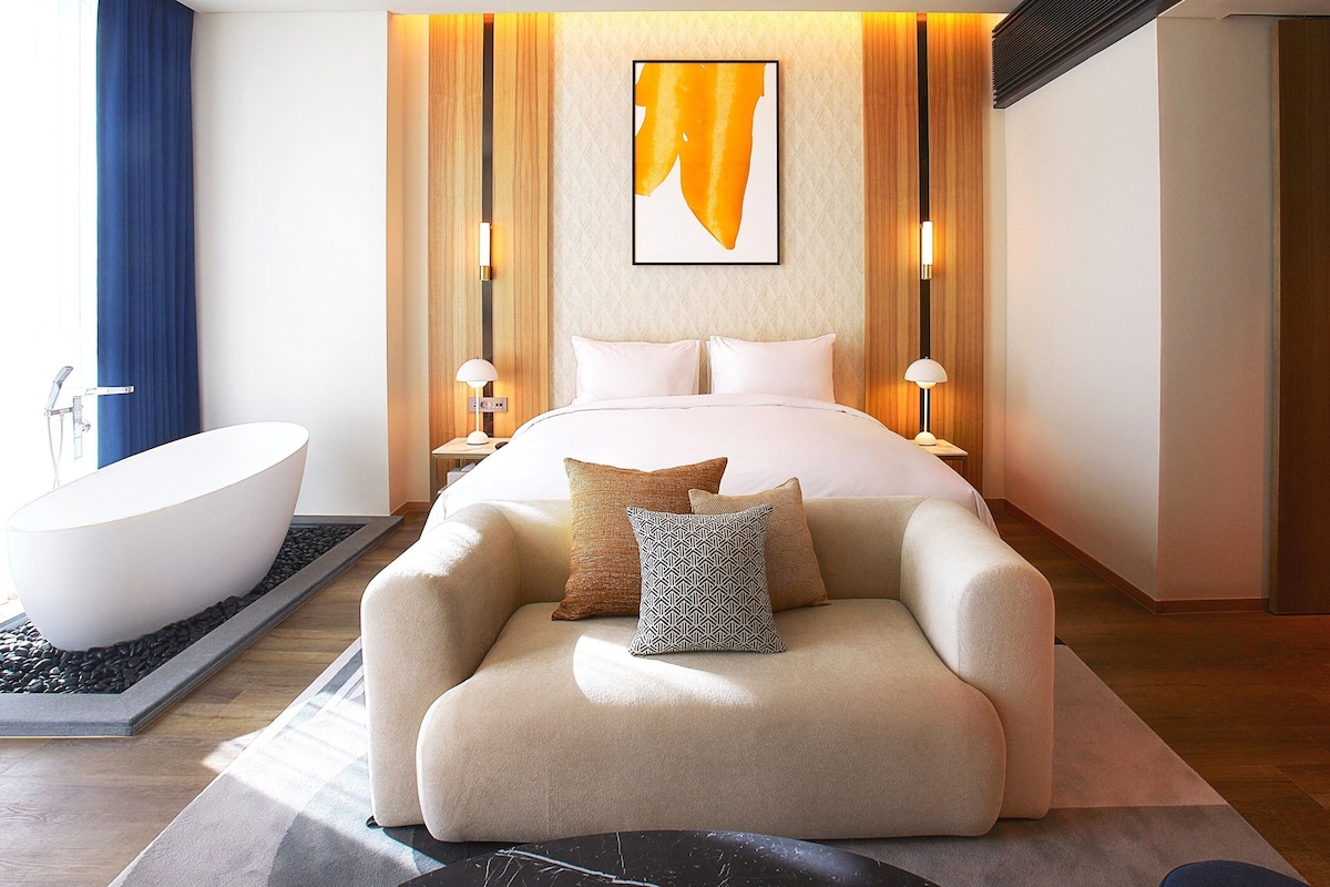 Suite, 1 King Bed with Sofa bed | Down comforters, minibar (free items), in-room safe, blackout drapes