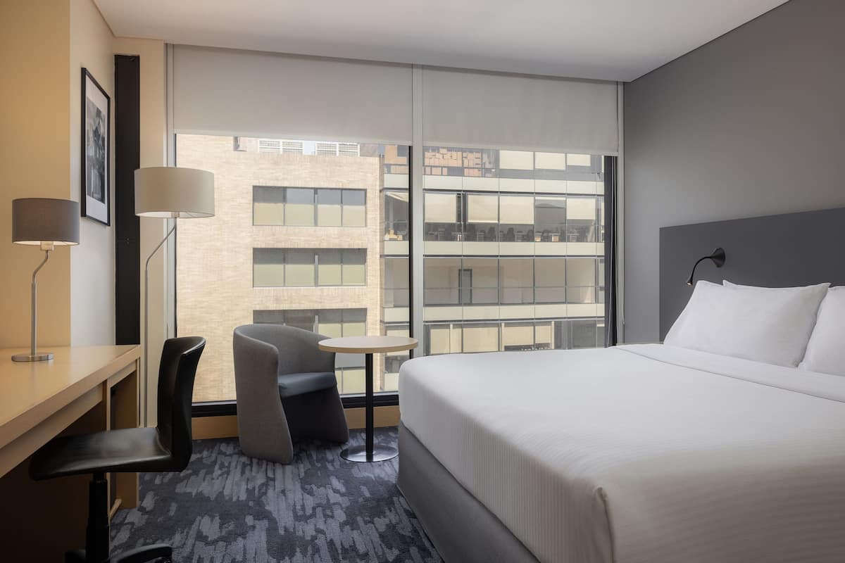 Premium Room, 1 King Bed | 1 bedroom, in-room safe, blackout drapes, soundproofing