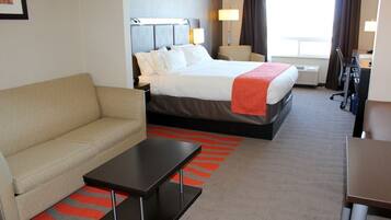 Suite Room with King Bed plus Sofa bed in Living area | Living area | 37-inch LCD TV with digital channels