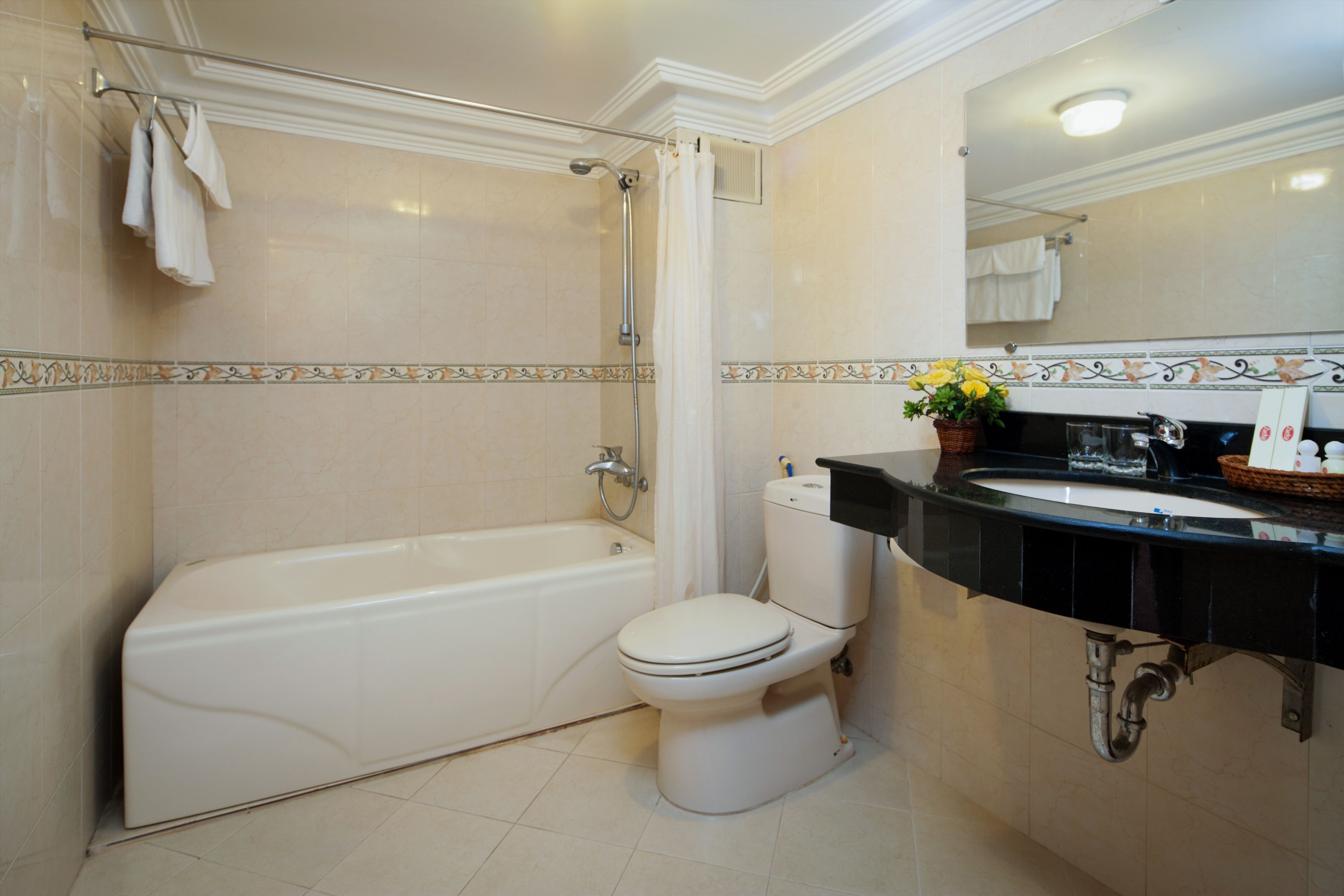 deluxe twin room | bathroom | bathtub, designer toiletries, hair dryer, bathrobes