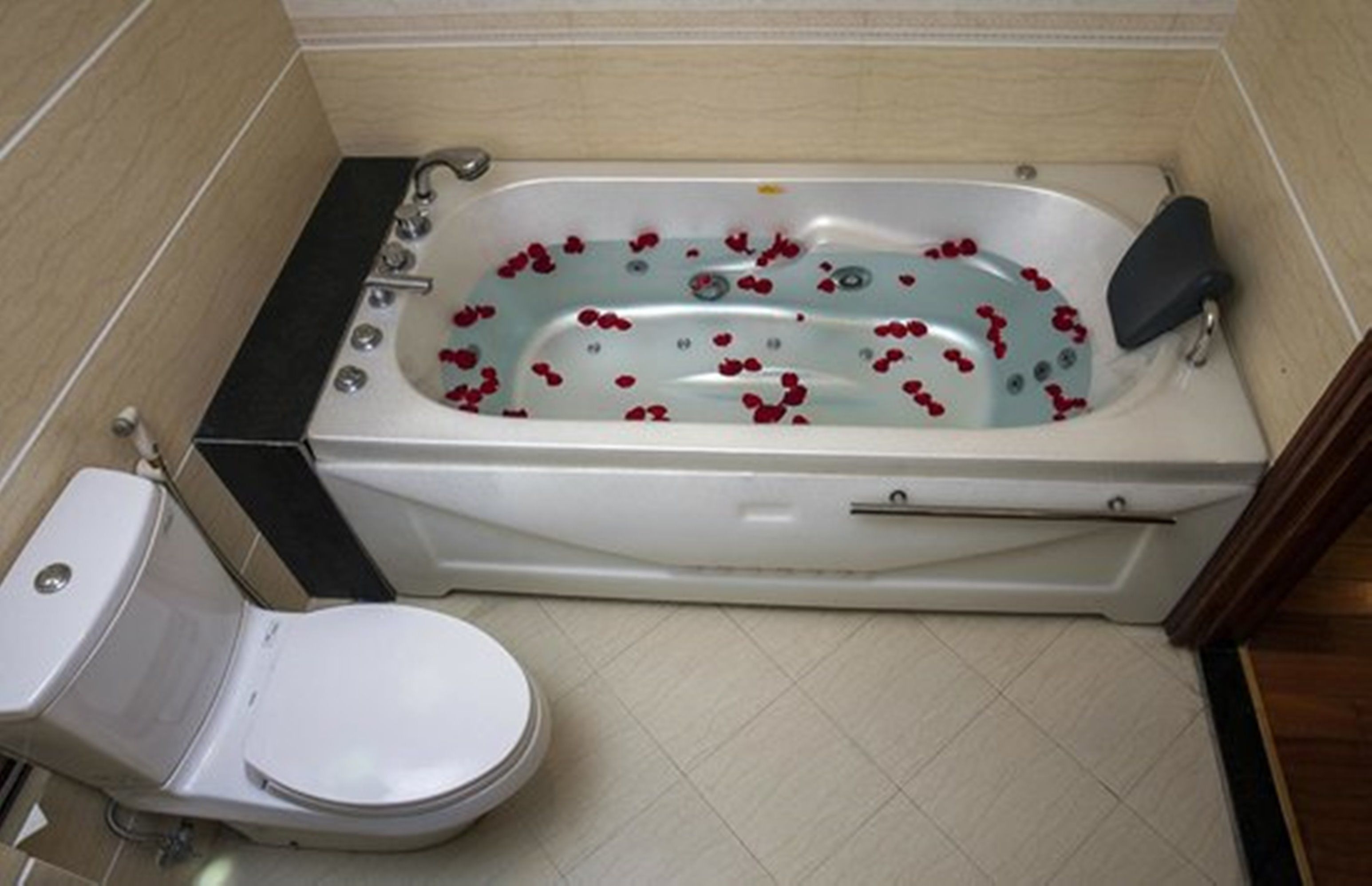 bathtub, designer toiletries, hair dryer, bathrobes