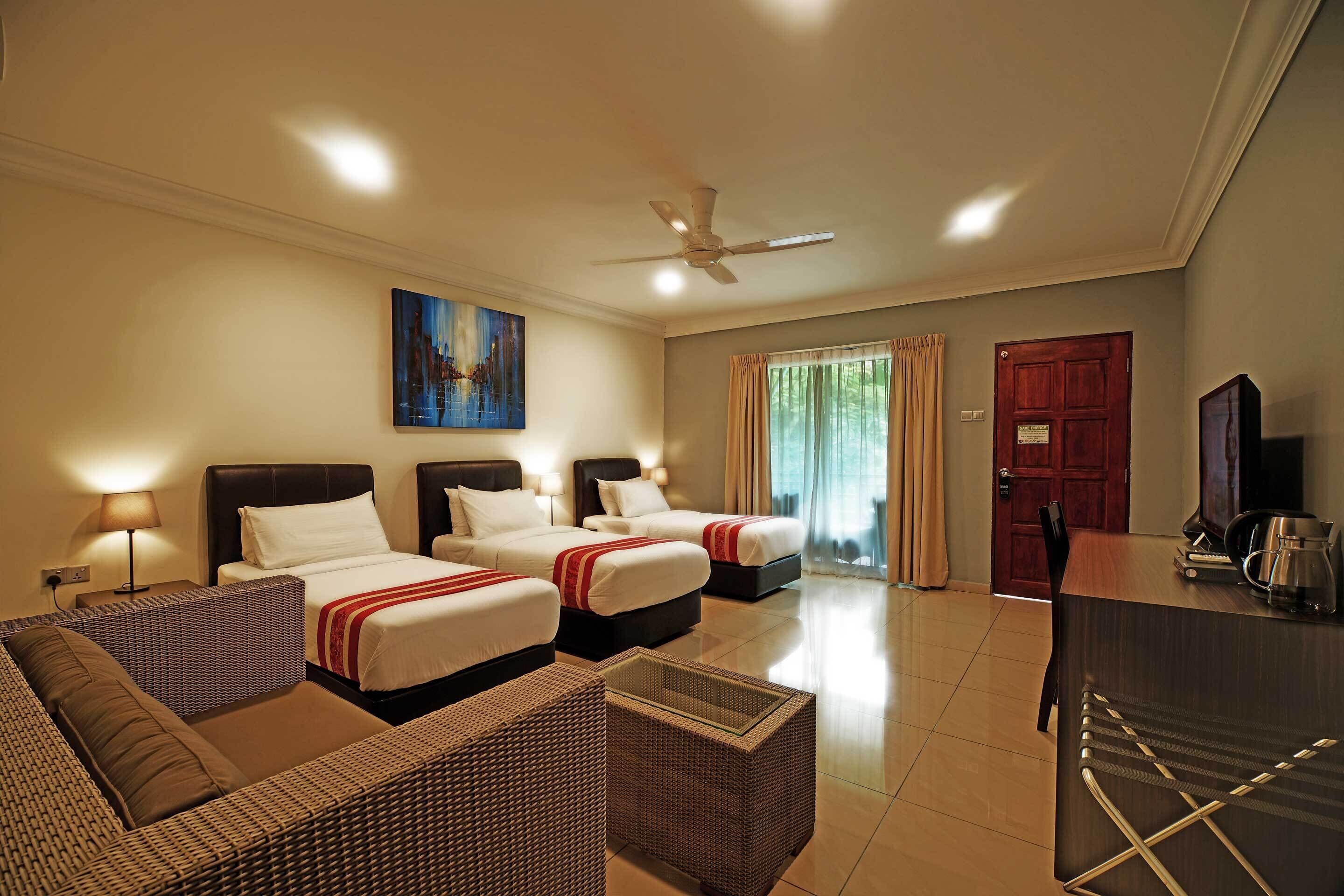 executive triple room (with a/c) | memory-foam beds, in-room safe, desk, blackout curtains