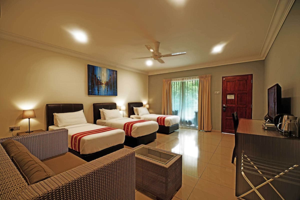 executive triple room (with a/c) | memory-foam beds, in-room safe, desk, blackout curtains