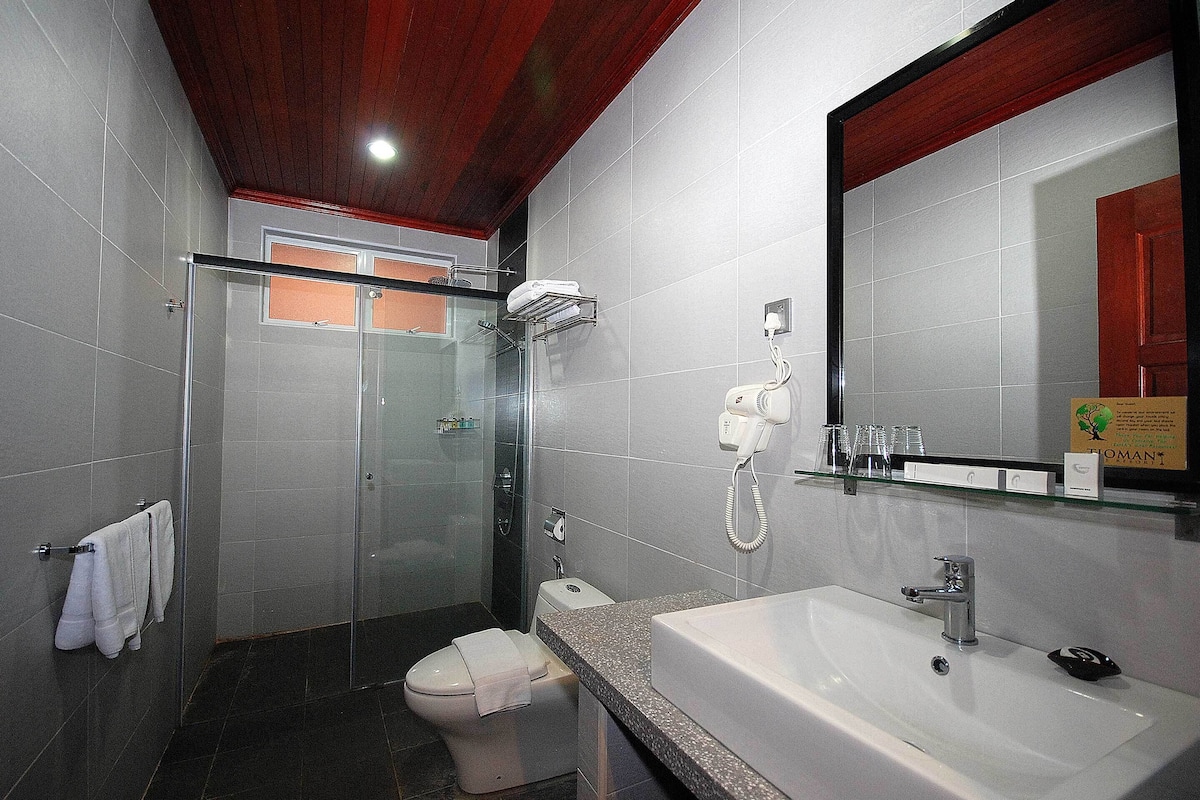 shower, hair dryer, bidet, towels