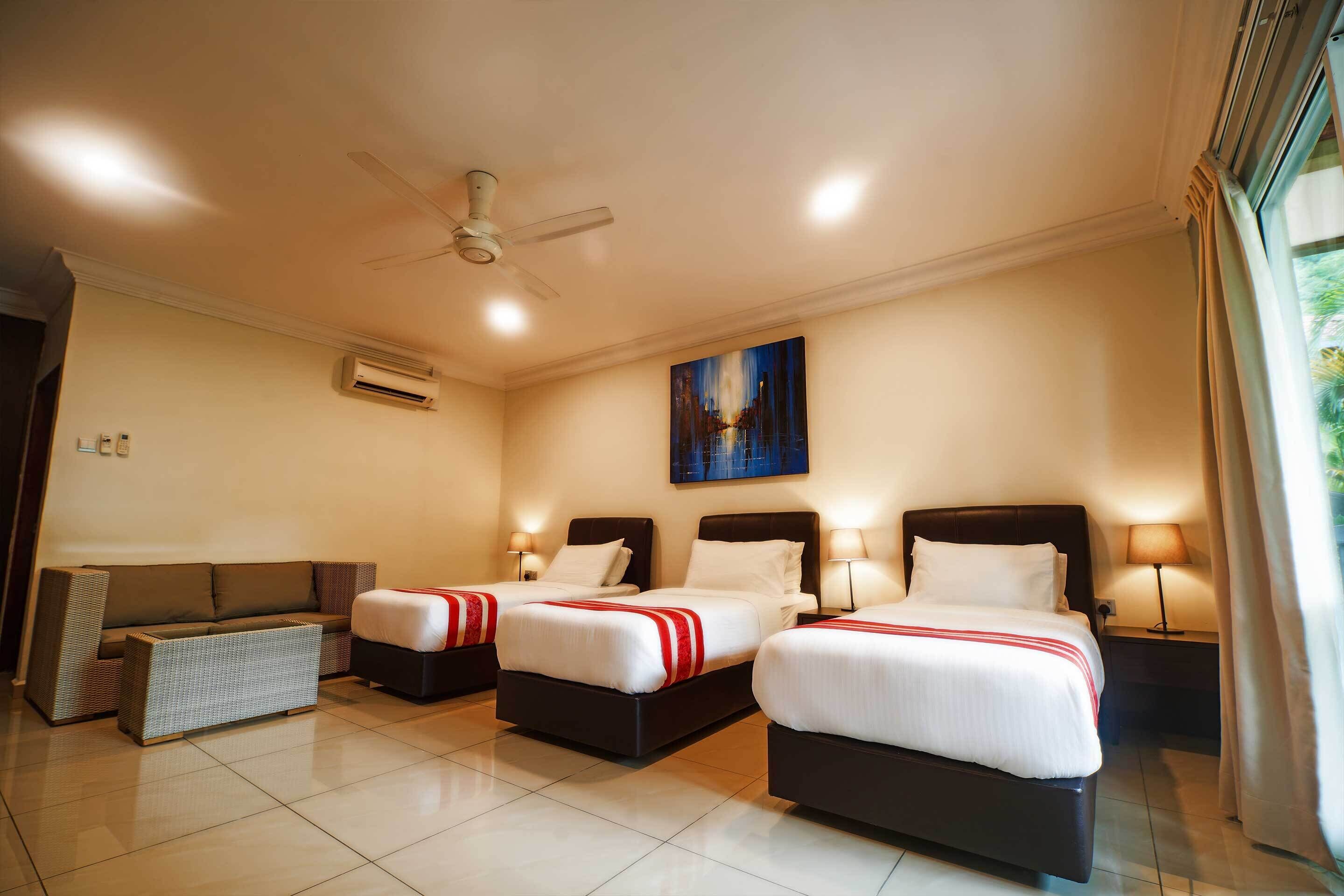 executive triple room (with a/c) | memory-foam beds, in-room safe, desk, blackout curtains