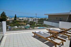 Suite, uitzicht op zee | Uitzicht vanaf balkon