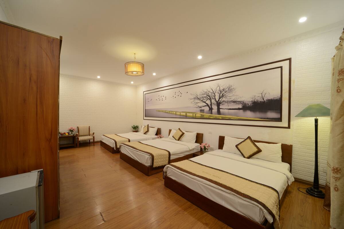 Family Room, Multiple Beds | Minibar, in-room safe, desk, soundproofing