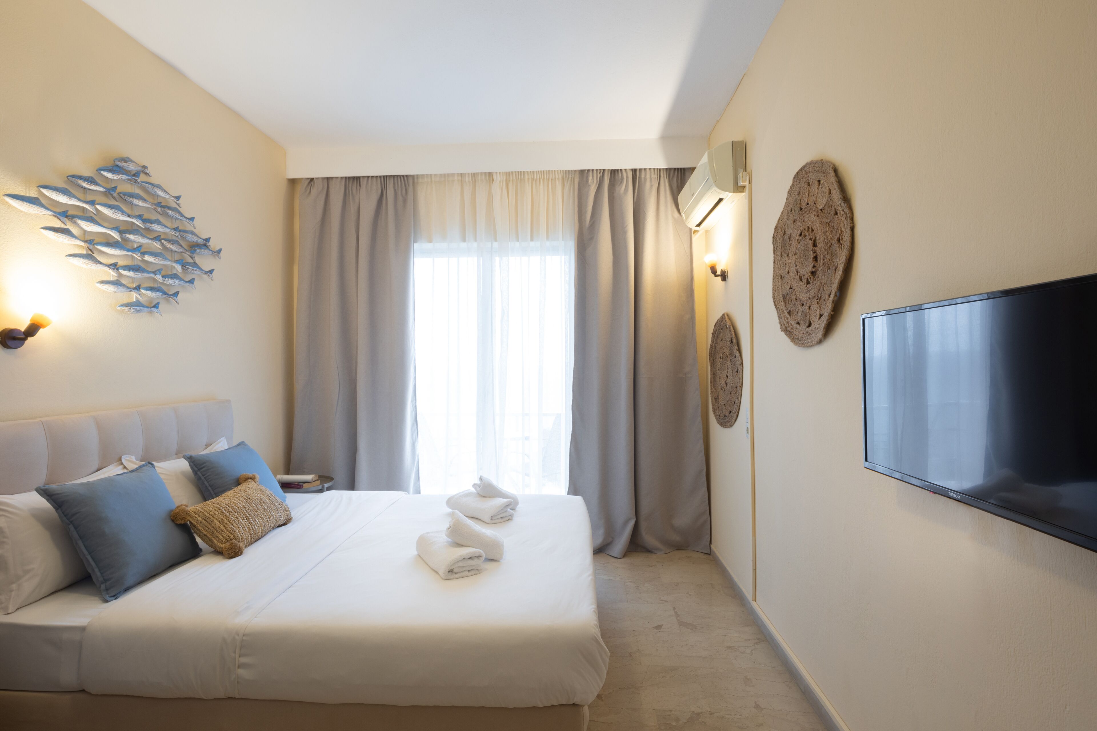 family room, partial ocean view | in-room safe, desk, blackout curtains, soundproofing