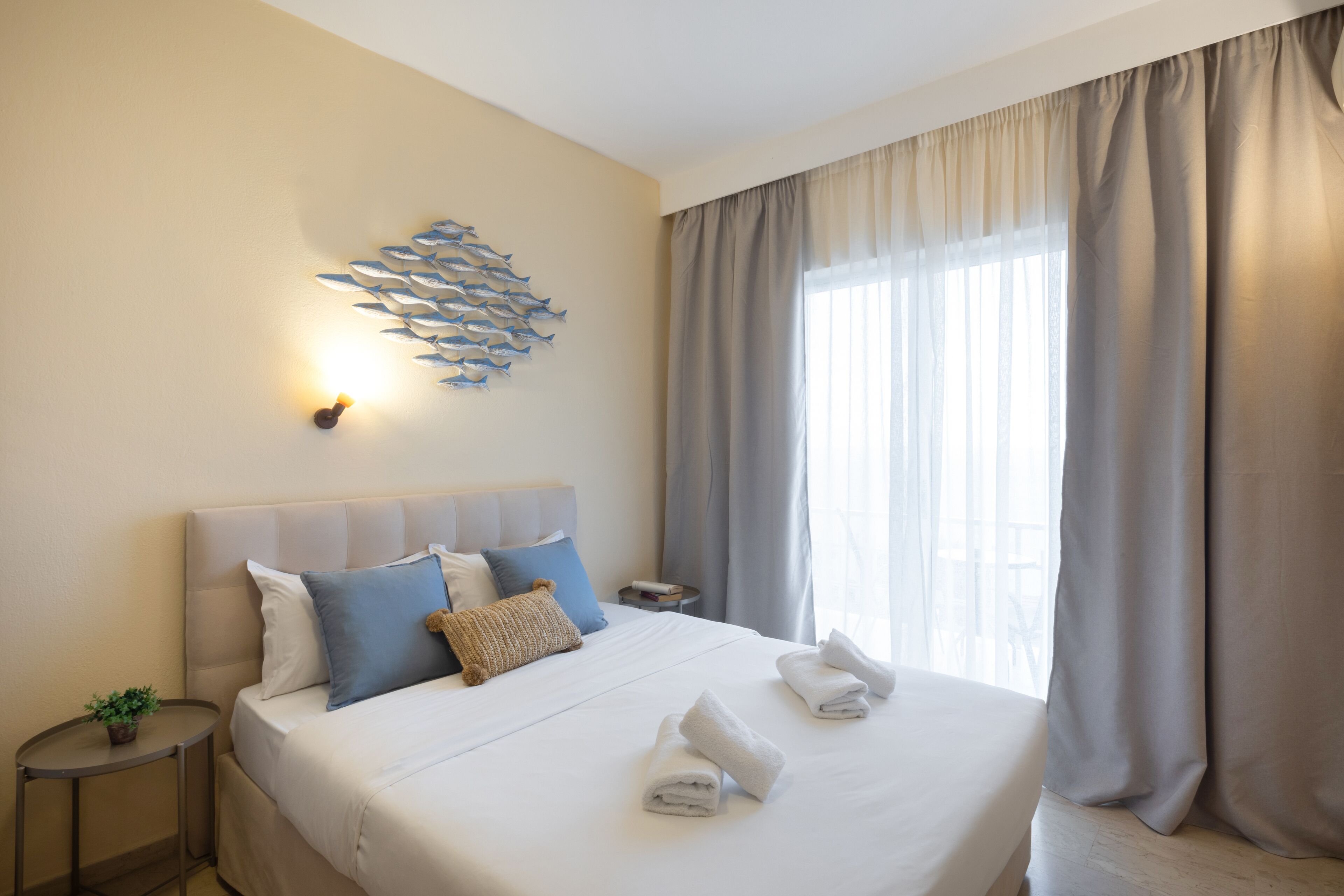 family room, partial ocean view | in-room safe, desk, blackout curtains, soundproofing