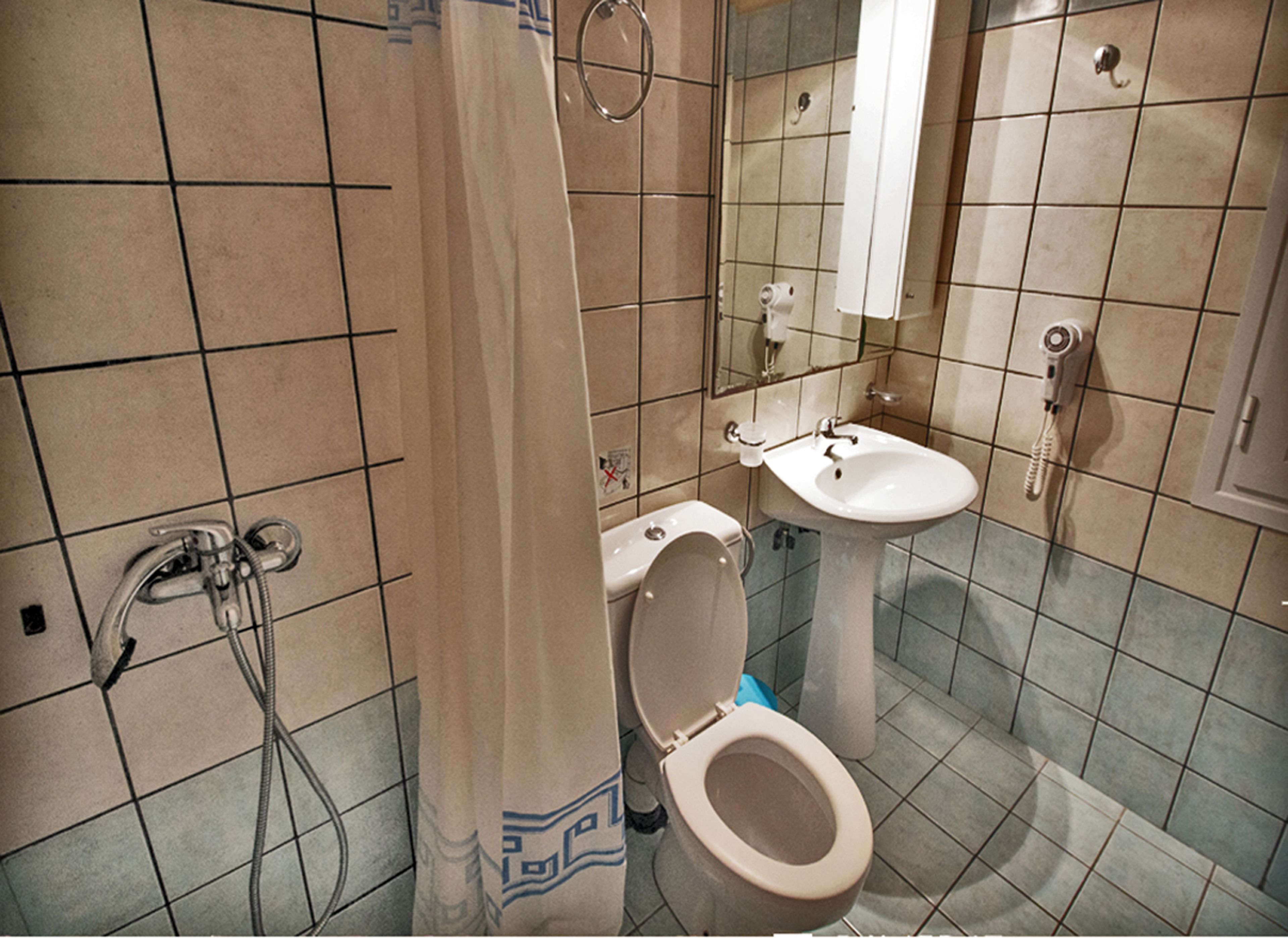 studio | bathroom | hair dryer, slippers, towels