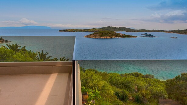 A balcony with a view of a calm sea and distant islands. - Thalassokipos (Sithonia)