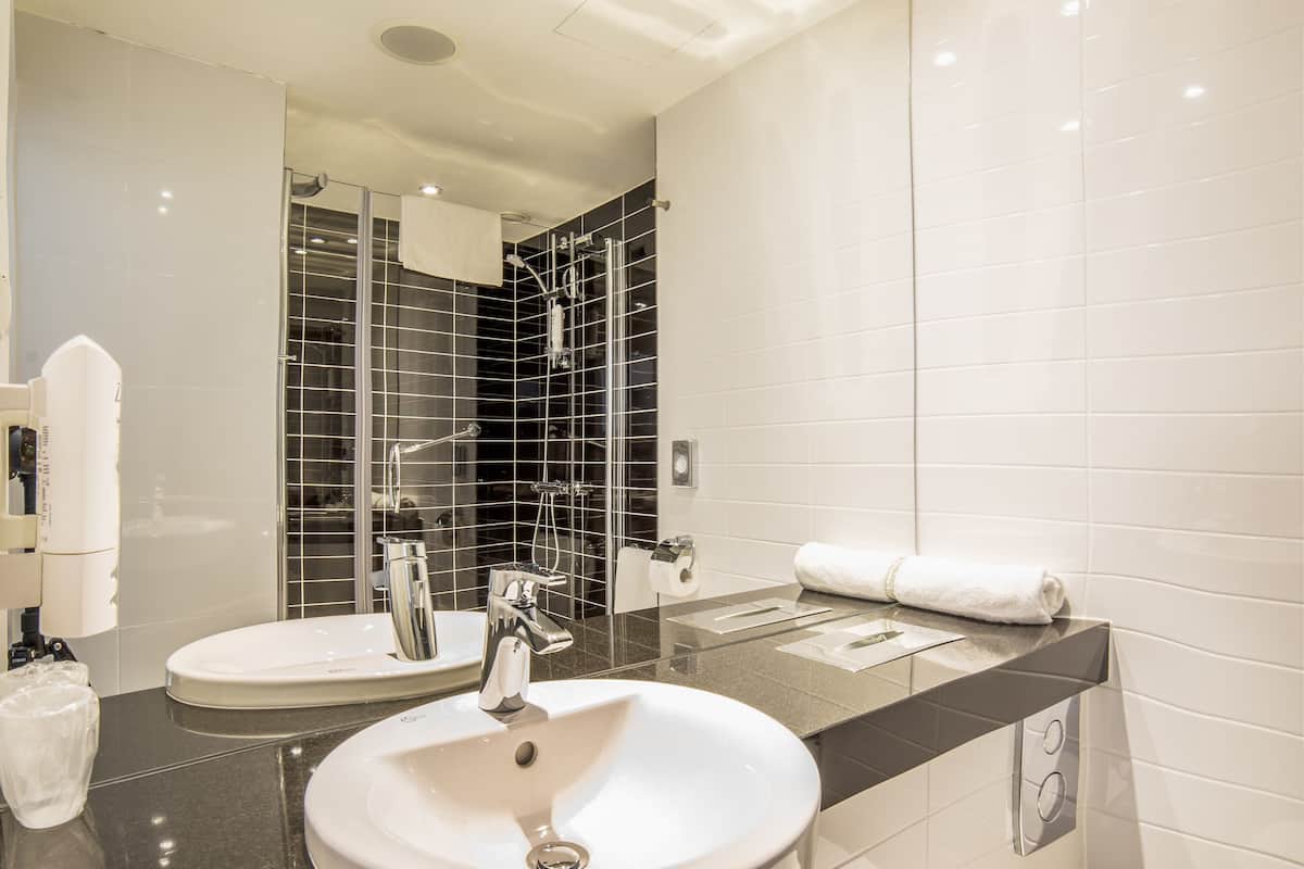 shower, eco-friendly toiletries, hair dryer, towels