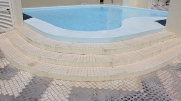 2 outdoor pools, pool umbrellas, pool loungers