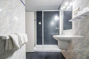 Shower, towels, soap, shampoo