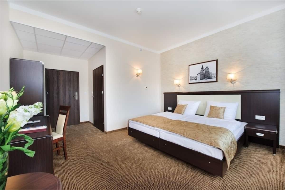 double or twin room | in-room safe, desk, iron/ironing board, rollaway beds