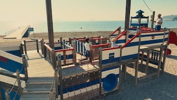 On the beach, beach umbrellas, beach volleyball