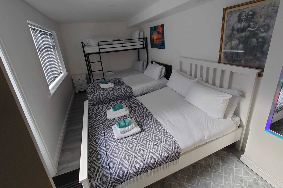Family Room, Multiple Beds | Desk, iron/ironing board (on request), WiFi (free)