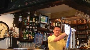 A bar with a chalkboard sign reading "Wines of the Month" and "Selection of Guest Beers". - The Kinder Lodge (High Peak)