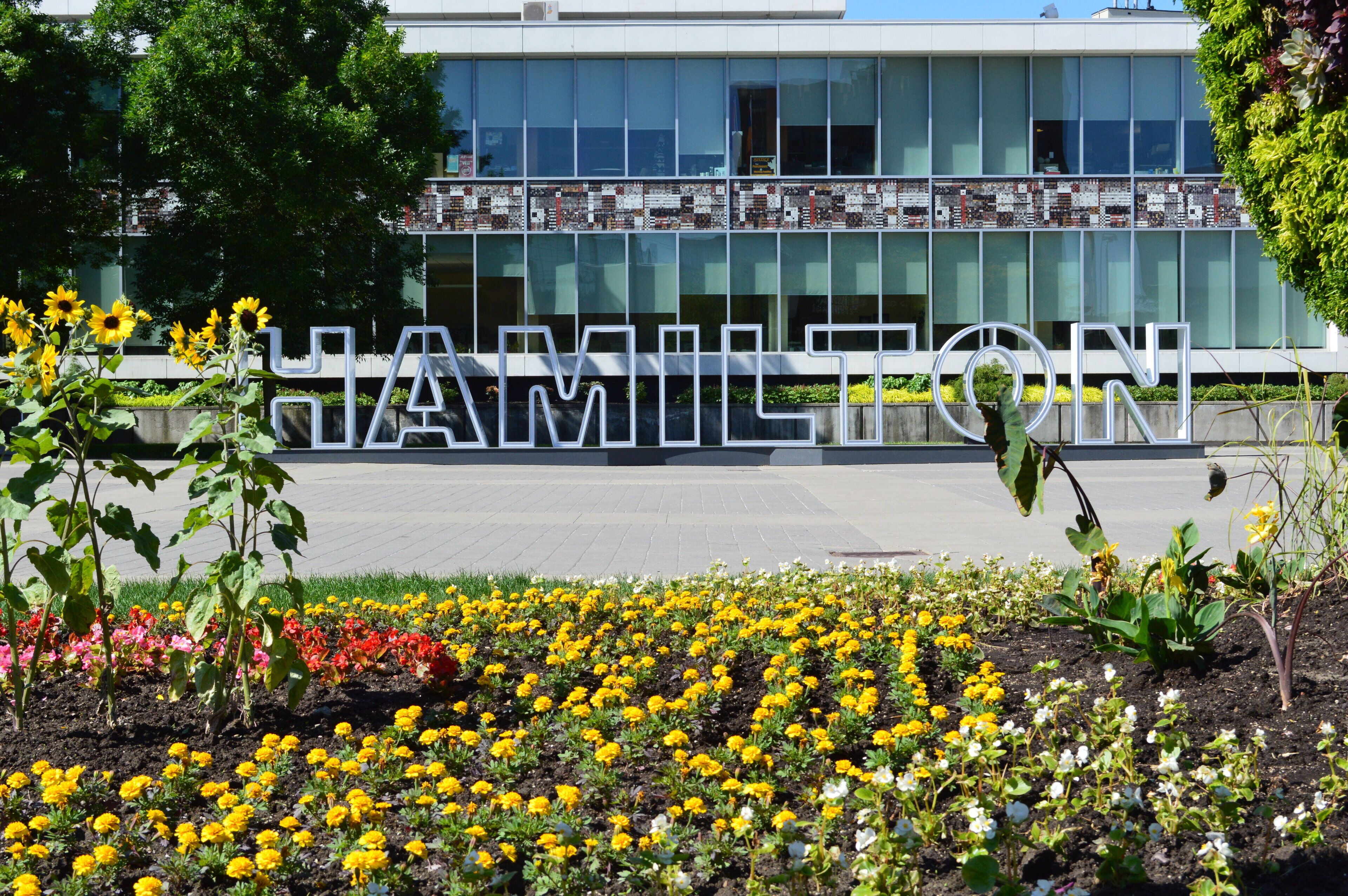 A building with the word 'HAMILTON' displayed prominently in front.