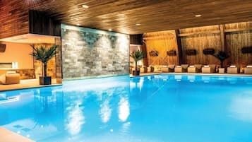 Indoor pool, open 8 AM to 10 PM, pool loungers