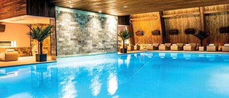 Indoor pool, open 8 AM to 10 PM, pool loungers