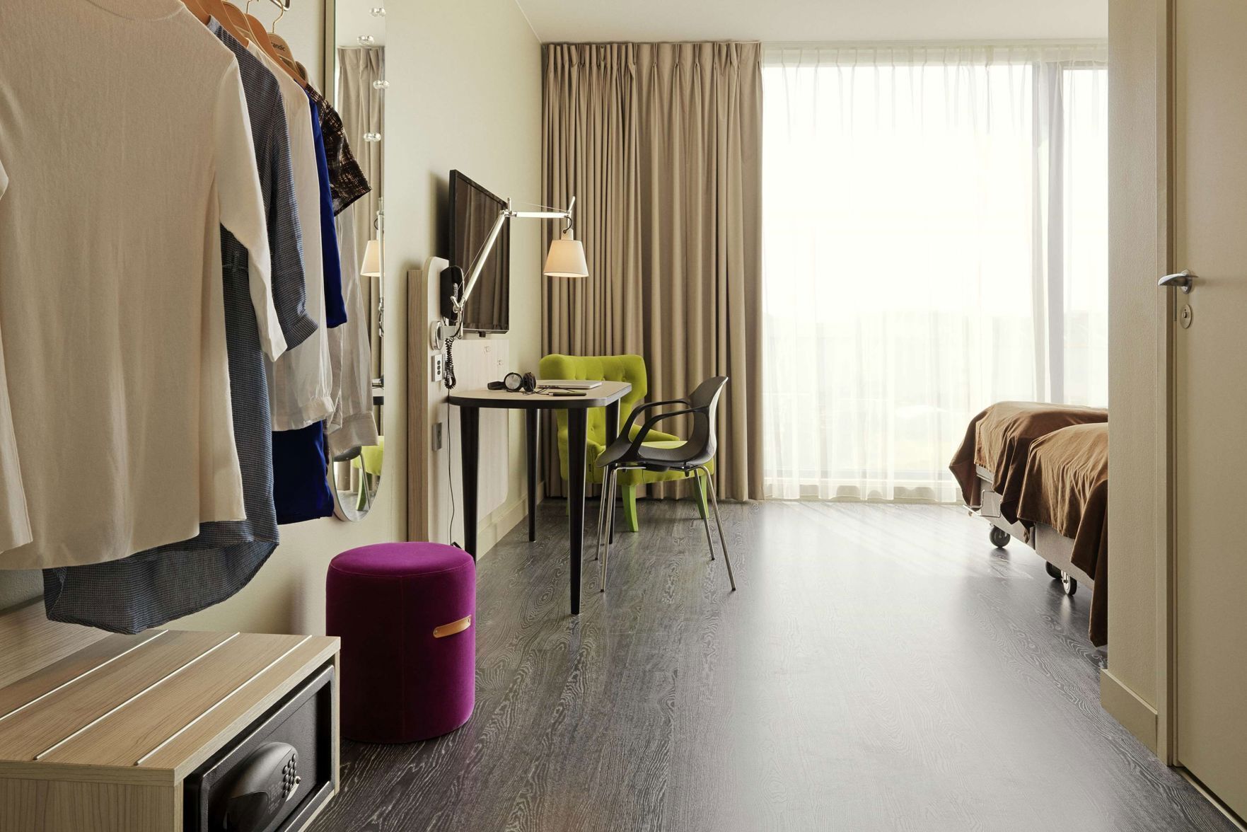 Desk, laptop workspace, blackout drapes, iron/ironing board