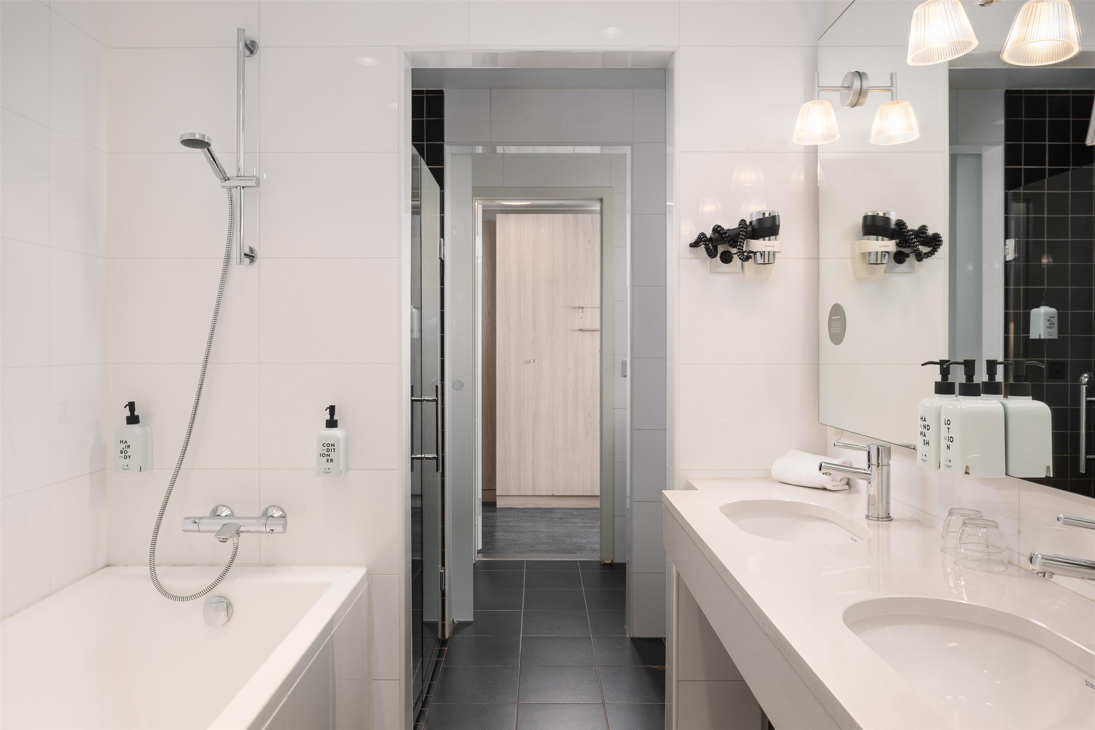 junior suite | bathroom | hair dryer, towels, soap, shampoo