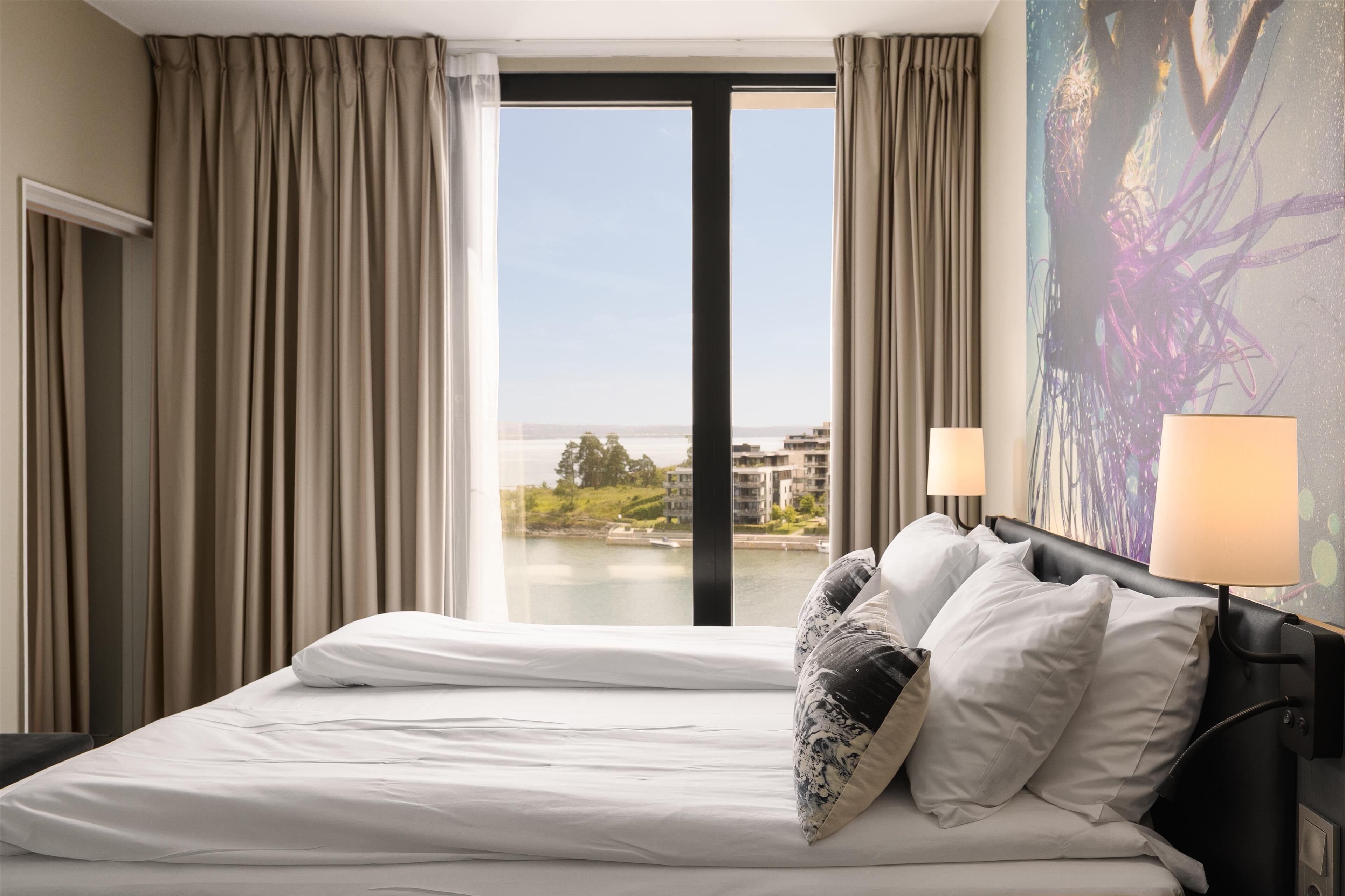 junior suite | desk, laptop workspace, blackout curtains, iron/ironing board