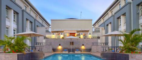 Outdoor pool, pool umbrellas, pool loungers