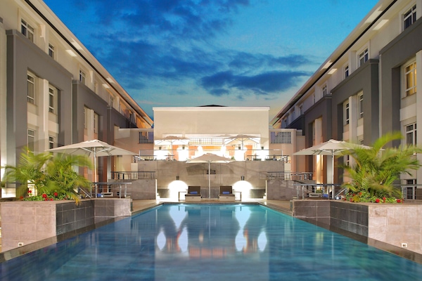 Outdoor pool, pool umbrellas, sun loungers