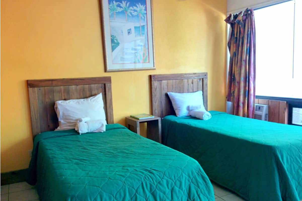 basic twin room | premium bedding, desk, free wifi, bed sheets