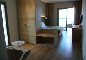 Habitación individual estándar | Minibar, caja fuerte, cunas gratuitas y camas supletorias