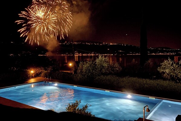 Seasonal outdoor pool, pool loungers